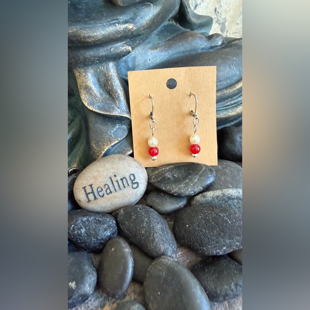 Handmade Stainless steel lever back red and white bead earrings.